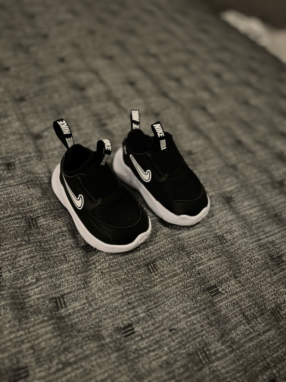 Nike Kids Black and White Slip-On Sneakers with Hook Strap